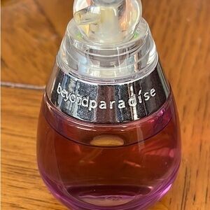 Estée Lauder  Beyond Paradise Purple Perfume 1 fl oz Bottle almost full.